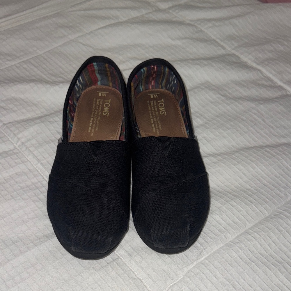 TOMS Classic Black Canvas Slip-Ons